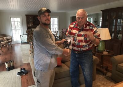 General West presenting a copy of the book, Desert Storm, to former Marine Sgt Jay Hill. Who served as a guide on Patriot 4's Wounded Vent hunt at Midland Preserve in South Carolina.